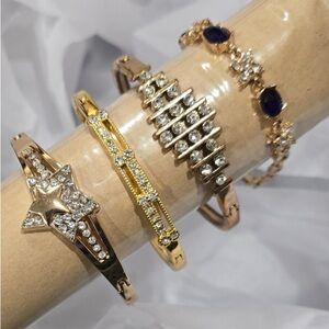 Gold Tone 6 Piece Bracelet Set  1  w/Star design, 1 w/Sapphire stones, 1 w/charm